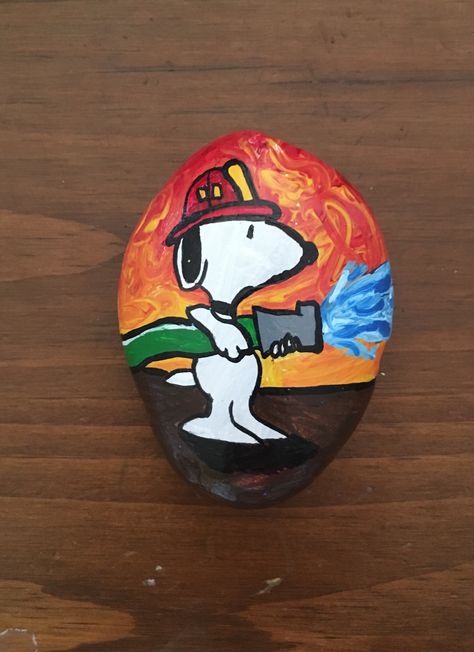 Police Painted Rocks, Firefighter Painting Easy, Firefighter Painting, Red Truck Rock Painting, Firefighter Painting Ideas, Firefighter Wood Burning Ideas, Campfire Painted Rock, Firefighter Art, Painted Rocks Craft