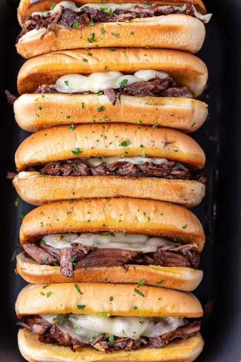 Slow Cooker French Dip Sandwiches - flavor-packed slow cooker french dip sandwiches with melted provolone cheese and toasted garlic bread rolls. French Dip Rolls, Cooler Recipes, Garlic Bread Rolls, Slow Cooker French Dip Sandwiches, Slow Cooker French Dip, French Dip Sandwiches, Slow Cooker Barbacoa, Homemade Garlic Butter, Dip Sandwiches