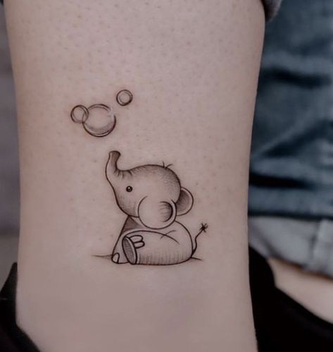 Bear And Elephant Tattoo, Dumbo Elephant Tattoo, Panda And Elephant Tattoo, Elephant Tattoos Minimal, Elephant Angel Tattoo, Elephant Minimal Tattoo, Cute Elephant Tattoos For Women, Elephant Flash Tattoo, Pink Elephant Tattoo