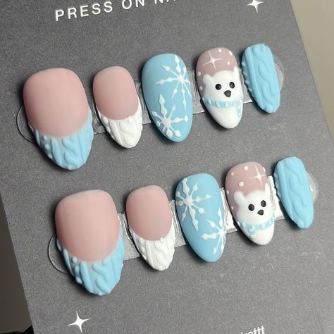 winter polar bear nails? yes please 🥹❄️ these are the cutest nails I’ve done yet, my first ever winter nails too! 10/10 would make again! 🖤 style:short almond design tier: moderate all nails by kirst press on nails are durable, reusable, and hand painted by me! like this set? get started with your press on nail order by ordering a sizing kit on my website (linked in my bio) or send me a dm! 🥰❄️✨ 🏷️: cute winter press on nails #pressonnails #winternails #christmasnails #nailinspo #winter... How To Do The Sweater Nails, Winter Nails Polar Bear, Christmas Nails Polar Bear, Winter Animal Nails, Winter Sets Nails, Nail Sweater Design, French Tip Sweater Nails, 3d Winter Nails, Kawaii Winter Nails