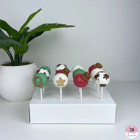 Custom cake pops for a My First Rodeo themed Party for a first birthday party Rodeo Cake Pops, My First Rodeo Cake, My First Rodeo Party, First Rodeo Cake, Rodeo Cake, First Rodeo Party, Rodeo Party, Custom Desserts, My First Rodeo