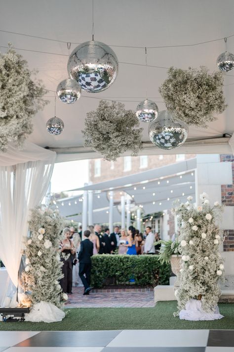 Disco Ball At Wedding Reception, Elegant Disco Ball Wedding, Reception Disco Ball, Disco Ball Wedding Decor Dance Floors, How To Hang Disco Ball, Hanging Disco Balls Wedding, Outdoor Disco Ball Wedding, Disco Ball Floral Chandelier, Disco Ball Hanging Installation