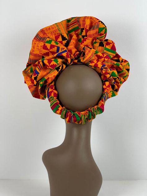 This ankara Scrunchie Ruffle statement headband  is absolutely gorgeous. This statement piece is great for any occasion. Made with 100% Ankara cotton fabric.  There is elastic on the back.  Care Instructions  -Machine Wash and Air Dry or Dry Clean Head Bows For Women, Ankara Headband Styles, Head Band Styles, Ankara Scrunchies, Fascinator Designs, Kitenge Dress Designs, Ankara Headband, Ruffle Scrunchie, Ankara Accessories