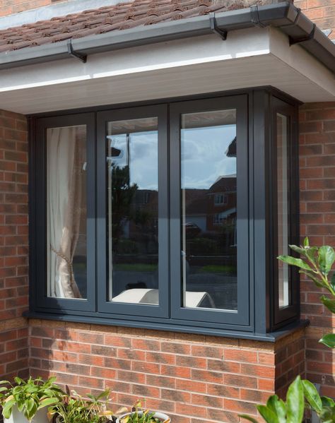 Our aluminium windows are strong and secure, they come with multi-point locking and internal beading, and are backed by a 10-year product guarantee.    Each double-glazed unit has a u-value of 1.3 while the triple-glazed units are 0.8.  Building regulations currently stipulate a u-value of 1.6.    Our aluminium windows come in different colour options: Pure White and Anthracite Grey.  They can be supplied in different colours inside and out. Non-standard colours available upon request. Aluminum Windows Design, Bay Window Exterior, Modern Window Design, Modern Window Grill, Window Grill Design Modern, House Window Design, Aluminium Windows And Doors, Window Glazing, Window Grill Design