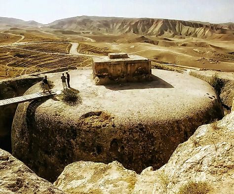 Ancient Treasures Of Afghanistan  Members of a French archaeological team walk on top of a giant 4th century Buddhist stupa cut into a mountain, on October 11, 2006 in Samangan province, Afghanistan. Artifacts from the area have been sent to the Musee Guimet in Paris, from Afghanistan's national museum in Kabul, and will be on display from December 2006 as part of the 'Afghanistan, Rediscovered Treasures' exhibition. The artifacts were saved from the looting of the Afghan national museum during Ancient Afghanistan, Afghanistan Culture, Buddhist Stupa, Stone Architecture, Ancient Mysteries, Ancient Aliens, Ancient Architecture, Ancient World, Ancient Artifacts