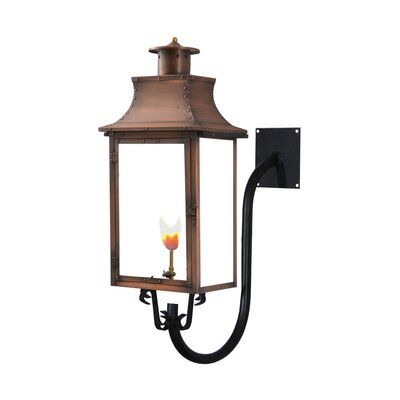 Longshore Tides The product of fixtures combines a straight-line look with classic copper lantern styling. The solid copper top and chimney wraps transitional and traditional in an attractive combination of yesterday and today. This 26 inch solid copper lantern features a distinctive flared top with tempered glass. ETL Certified. Size: 27" H x 13" W x 10" D | Longshore Tides Gravette Aged Copper Outdoor Wall Lantern, Metal in Copper/Black, Size 27" H x 13" W x 10" D | Wayfair Primo Lanterns, Lantern Styling, Hanging Gas Lantern, Copper Gas Lanterns Exterior, Outside Lanterns, Copper Wall Lantern Outdoor, Bronze Outdoor Wall Lantern, Copper Top, Outdoor Lantern Lights Wall Mounted 20 Inches High