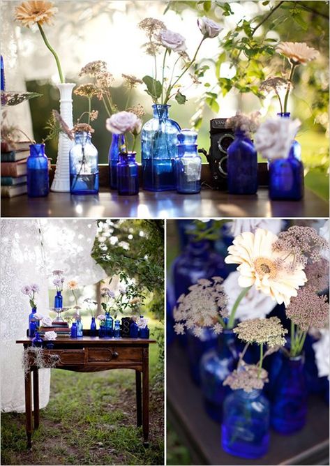 cobalt glassware wedding | image credits | cobalt blue glass bottles and containers : photography ... Cobalt Blue Weddings, Cobalt Glassware, Vases With Flowers, Blue Vases, Wedding Glassware, Blue Glass Bottles, Blue Wedding Inspiration, Floral Wedding Decorations, Royal Blue Wedding