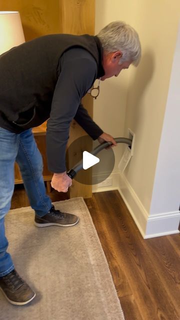 Hatcliff Construction on Instagram: "We put a HIDE-A-HOSE central vacuum system in many of our homes. They are extremely convenient because you don’t have to carry around a big bulky vacuum hose. Instead, this one retracts back into the wall. The hoses we use can reach up to 60’. The dirt that you vacuum up is sucked into a large canister, usually in a garage.  These vacuums come with attachments.  This particular hide-a-hose is in our @southernlivingmag Idea House. It will be open two more weeks. If you get a chance to go, see if you can find all of the vacuum outlets throughout the house. 

Builder @hatcliffconstruction 
Vacuum Installer - Best Vac
Designer @laurahodgesstudio 
Architect @lakeandlandstudio" Central Vacuum System, Retractable Hose, Central Vacuum, The Grove, Vacuums, Carry On, Garage, Wall, Instagram