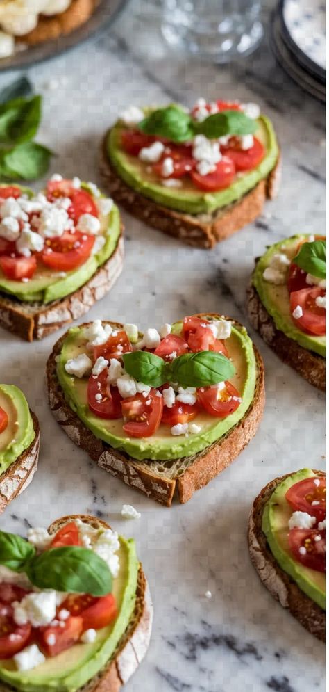 A photo of a  Amorous Avocado Toast Hearts a Valentines Day Appetizers Fun Valentine’s Day Dinner, Appetizer Valentines Day, Valentines Dips Food, Galentines Party Recipes, Finger Foods For Galentines Party, Valentine’s Day Food Dinner, Galantines Day Food Ideas, Valentines Day Savory Snacks, Valentines Day Appetizers Savory