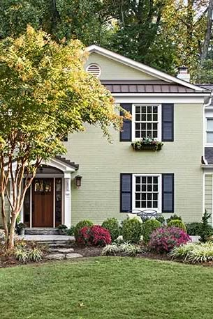 Brick painted pale green with black louvered shutters. Brick Interior Design, Painted Brick House Exterior, Green Siding, Painted Brick House, Black Shutters, Brick Interior, Brick Exterior House, Shutters Exterior, Exterior Remodel