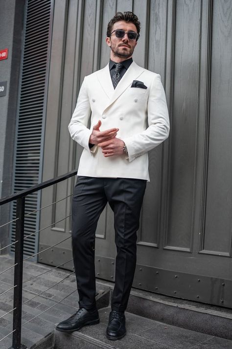 Embrace the art of refinement with our White Double Breasted Blazer. Impeccably tailored to accentuate your style, this iconic piece exudes timeless elegance and sophistication. Whether you're navigating the bustling city streets or attending an exclusive event, command attention with confidence and grace in this exquisite blazer.

#whiteblazer #blazer #doublebreasted #suit #suits #slimfit #menstyle #menfashion #fashioninspo #formalwear #menclothing White Double Breasted Blazer, White Blazer Men, Bow Tie Suit, Modern Fit Suit, Double Breasted Tuxedo, Suit Stores, Slim Fit Suit Men, Blazer Men, Lapel Jacket