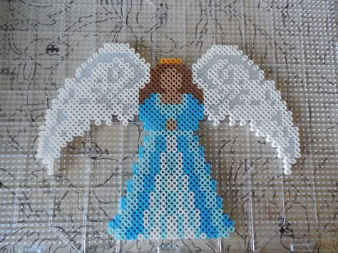 Angel in perler beads Perler Beads Angel, Angel Perler Bead Patterns, Jesus Perler Beads, Angel Perler Beads, Perler Beads Christmas, Hama Beads Christmas, Christmas Perler Beads, Hamma Beads Ideas, Easy Perler Bead Patterns