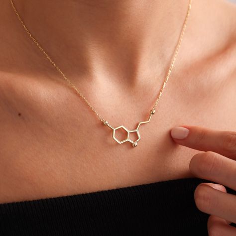 Serotonin Molecule Necklace, Happiness Symbol Necklace, Dopamine Necklace, Science Necklace, Gift For Her #serotoninmoleculenecklace #customnecklaces #serotoninjewelry 🌟 WELCOME TO OUR SPECIAL HANDCRAFTED COLLECTION! Dear Customers, We're thrilled to offer you a unique experience! Are you ready to explore our jewelry pieces, each handmade with love and care? Presenting a collection that epitomizes elegance and beauty... Each piece is a result of our artisans' meticulous craftsmanship. Cra... Chemistry Necklace, Serotonin Molecule, Chemistry Gifts, Molecule Necklace, Dna Molecule, Deeper Meaning, Symbol Necklace, Medical Art, Inspired Necklace