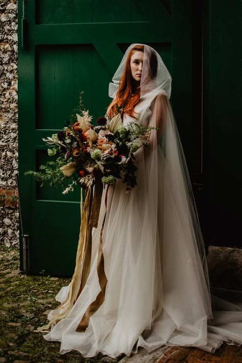 Dress Gown Bride Bridal Organza Ballet Cape Veil Hood Bouquet Flowers Bride Bridal Ribbons Orange Rose Dried Flowers Seed Heads Large Oversized Autumn Fall Elopement Wedding Ideas Oilvejoy Photography #WeddingBouquet #WeddingFlowers #BrideBouquet  #BridalBouquet #LargeBouquet  #OversizedBouquet #AutumnBouquet #FallBouquet #Wedding #WeddingDress #WeddingGown #Bride #Bridal #Organza #BalletCape #Veil #Wedding #WeddingCape #BridalCape #BrideCape #CapeVeil Bridal Hooded Cape, Cape Veil With Hood, Hooded Wedding Cape, Wedding Cape Veil Hood, Wedding Hood Veil, Bride Cape Veil, Wedding Dress With Hooded Cape, Mantle Wedding Veil, Hood Wedding Dress