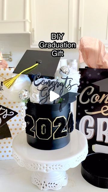 Trish 💕 Beautiful Lifestyle Blogger on Instagram: "DIY Graduation Gift 👩‍🎓🎉 Comment “graduation” for the links! How cute is this little graduation gift idea? You could use real flowers 💐 you could add candy or rolled up money 💴 There’s so many ideas you could do! I thought it was so cute! I can’t wait to give it to my daughter for graduation 👩‍🎓 Isn’t it so cute ☺️  . . #graduation #graduationgift #graduate #grad #graduating #gradgift #graduationday #graduationpictures #diy #diycrafts #diycraft #gift #giftidea #gifts #giftbox #giftideas #giftguide #giftwrapping #giftbaskets #giftsforher #giftideasforher #giftboxes #diyprojects #diyproject #diyparty #partytime #celebrate #partyideas #partydecorations" Diy Graduation Gifts For High School, Diy Graduation Gift, Graduation Gifts College, Graduation Gift Basket, Graduation Money Gifts, Diy Graduation Gifts, Beautiful Lifestyle, Graduation Money, Diy Graduation