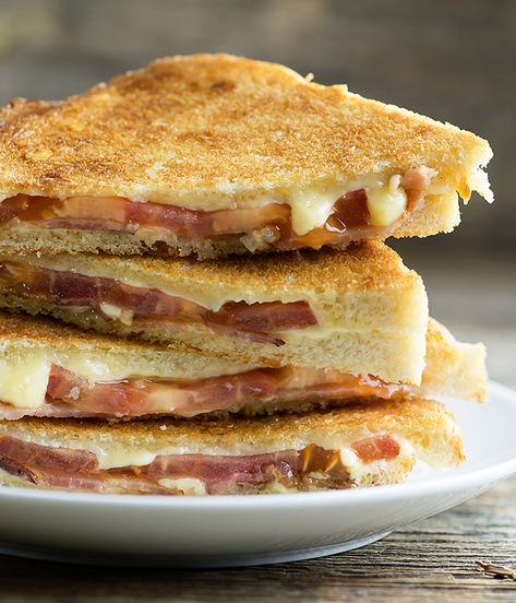 Irish cheese, thick bacon and a sliced tomato can take a regular grilled cheese sandwich to Irish deliciousness in this easy recipe! #cheese #Irish #grilledcheese #sandwich #lunch #comfortfood #homecooking #framedcooks Pub Cheese Recipe, Irish Bacon, Ham And Cheese Toastie, Irish Cheddar, Sandwhich Recipes, Bacon Egg And Cheese, Canning Tomatoes, Charcuterie Recipes, Sliced Tomato