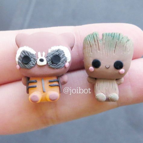 Baby Rocket & Baby Groot. 💕  I fell asleep when I watched Guardians of the Galaxy 2..so I need to go back to the movies and watch it 🤣 #groot #rocket #gaurdiansofthegalaxy #polymerclay #polymerclaycharms #polymerclaycreations #kawaii #chibi #nerdy #cute #handmade #crafty #etsy #premo #sculpey #fimo Groot Clay Sculpture, Clay Marvel Ideas, Groot Clay, Marvel Clay Ideas, Fimo Kawaii, Groot Rocket, Polymer Clay Disney, Polymer Clay Kawaii, Clay Magnets