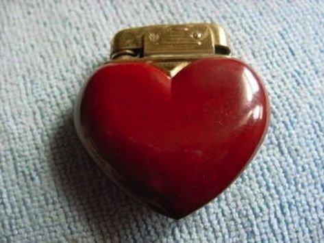 Solution: Heart-shaped lighter! I'll bring the gasoline! | 8 Valentine's Day Gifts For Taylor Swift Vintage Lunch, Cool Lighters, Antique Vintage Jewelry, Worlds Fair, Pez Dispensers, Furniture Antique, My Funny Valentine, I'm With The Band, Antique Store