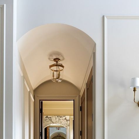 Marianna Tomlenovich on Instagram: "A barrel vault ceiling hallway that leads to a Viola marble detailed Powder room at our Toscana project.  . . Builder @eurodreamcustomhomes  Photographed by @shotify.ca  . . #powderroom #homedesign #bathroom #interiordesign #barrelceiling #arches #violamarble #marblecountertops #hallwaydecor #architecture #homedecor #smmakelifebeautiful #howyouhome #housebeautiful #interiordecor #luxuryhomes" Barrel Vault Hallway, Barrelled Ceiling, Barrel Vaulted Ceiling, Vault Ceiling, Barrel Vault, Stone Porches, Barrel Vault Ceiling, Hallway Ceiling, Viola Marble