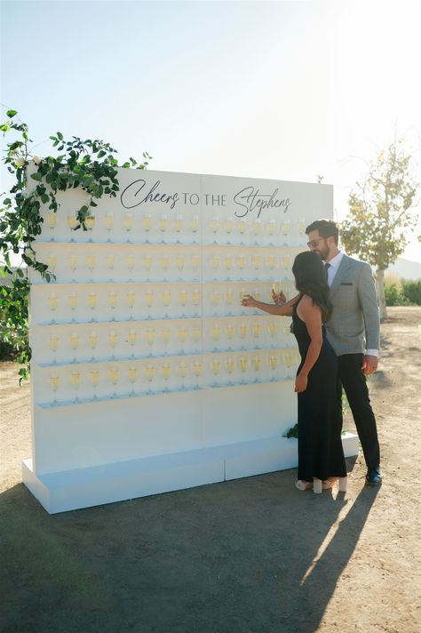 A glass of bubbly upon guest arrival? Yes, please! We loved this champagne welcome wall from Jordyn & Spencer's magical wedding day ✨ Wedding Planning & Design @taylordeckerevents Venue @crcranch_weddings Florals @haus.and.company Specialty Rentals @twoofakindrentals Specialty Signage & Installations @badercollective Wedding Signage @typejcreative #TaylorDeckerEvents #Wedding #Planning #TemeculaWedding #LocationWedding #WeddingPhotos #Champagnewall #WeddingInspo #WeddingStyles Wedding Welcome Champagne, Champagne Seating Chart Wedding, Champagne Welcome Wall, Champagne Seating Chart, Champagne Wall Wedding, Reception Theme, Save The Date Video, Welcome Wall, Wedding Champagne Glasses