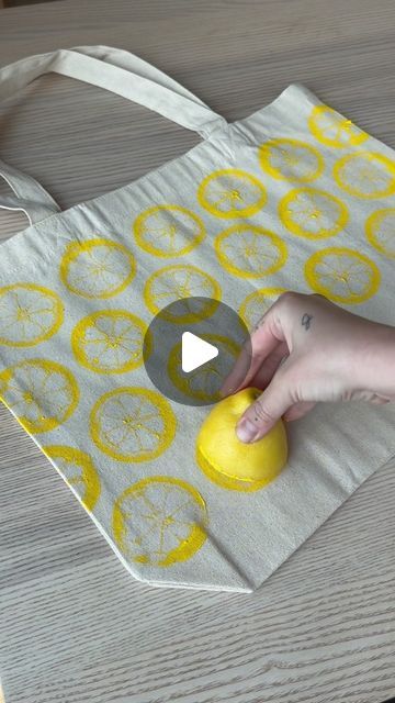 Pinterest on Instagram: "When the craft is worth the squeeze. Make this Monday a crafty one with @kateelay produce print tote bag. 🍋🍋‍🟩  Materials needed:  - Canvas tote bag (you can find these at craft stores) - Lemon yellow & lime green acrylic paint - Paint brush - 1 lemon & 1 lime or fruit of your choice - Paring knife to de-pulp fruit  Instructions:  1. First, iron or steam your canvas tote bag to remove any wrinkles  2. With your paring knife, carefully cut the meat of the fruit out without altering the skin inside  3. Paint the surface of the lemon & lime with a paint brush using yellow & green acrylic paint, or your preferred colors 4. Firmly press the painted fruit onto the canvas tote 5. Have fun with it and play with varying patterns!" Decorating Tote Bags, Fruit Tote Bag, Decorated Tote Bags, Storing Lemons, Painted Canvas Bags, Lemon Crafts, Canvas Bag Diy, Art Fil, Diy Projects Gifts