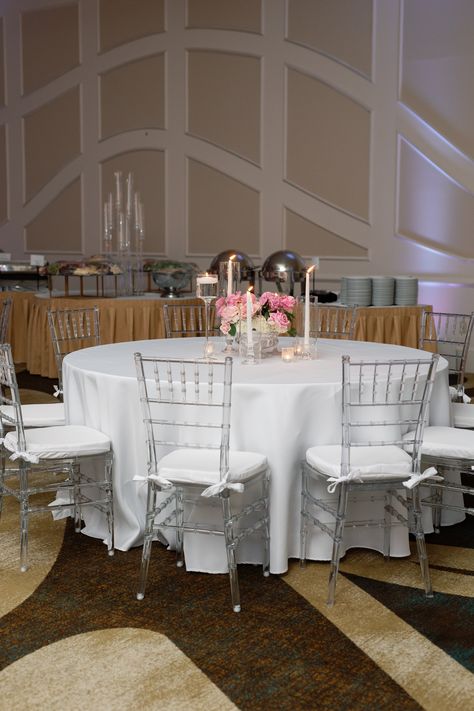 Embodying the epitome of versatility and elegance, our Clear Chiavari Chairs seamlessly blend into any wedding venue, yet stand out with their timeless charm. Crafted to adapt to diverse settings, they effortlessly complement any decor theme, allowing your vision to shine through. With their transparent design, these chairs create an illusion of space and light, enhancing the ambiance of your ceremony or reception. Clear Chiavari Chairs, Illusion Of Space, Table Rentals, Chiavari Chairs, Table Arrangements, Transparent Design, Party Rentals, To Shine, Wedding Venue