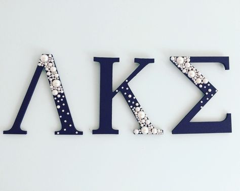 6" letters and pearls from Michael's Craft store #ΛΚΣ #pharmacy #LambdaKappaSigma #LKS Pearl Sorority Letters, Greek Letters Decorated, Sorority Crafts Letters, Diy Sorority Crafts, Sorority Letters Painted, Big/little Baskets, Little Gifts Sorority, Sigma Alpha Iota, Big Little Basket