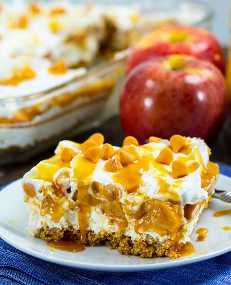 Fall in love with the flavors of autumn with our No-Bake Caramel Apple Lush! 🍏🍂 This delightful dessert features four incredibly delicious layers, each bursting with creamy, caramel-apple goodness. Easy to make using a can of apple pie filling, this no-bake treat combines the comfort of apple pie with the richness of caramel in a lusciously creamy form. Perfect for any fall gathering or a cozy night in, this dessert is a fuss-free way to enjoy the seasonal flavors without turning on the oven.... Baked Caramel Apples, Baked Caramel, Apple Pie Filling, Creamy Caramel, Fall Gathering, Apple Pies Filling, Cozy Night, Caramel Apple, No Bake Treats