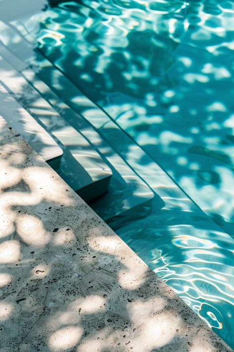 Transform your backyard into a stunning oasis with these stylish concrete pool deck ideas. Make a splash this summer by choosing designs that bring together aesthetic appeal, comfort, and durability. From classic grey finishes to colorful options, there's something for every taste and energy level. Consider decorative stamped patterns or textured surfaces that can withstand heavy foot traffic and poolside fun. Discover how you can elevate your outdoor space and enjoy long-lasting materials that beautify your home while providing safe and enjoyable pool access. Concrete Pool Deck Ideas, Wood Pool Deck, Together Aesthetic, Concrete Pool Deck, Deck Renovation, Pool Deck Ideas, Paver Designs, Deck Colors, Deck Paint