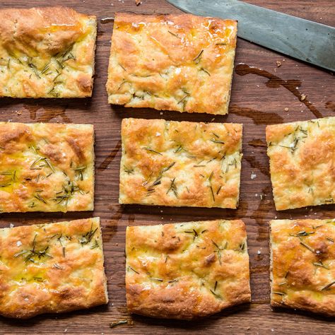 Pizza Bianca Recipe | Epicurious Chicken Bianca Pizza, Pizza Bianca Recipe, Italian Flatbread, Rosemary Olive Oil, Pizza Bianca, Pizza Peel, Pizza Stone, Food Processor, Baking Sheets