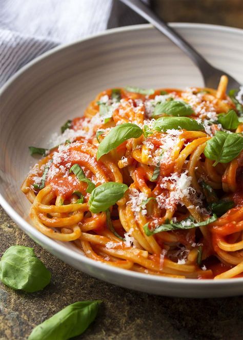 For an authentic Italian dinner, try my pasta al pomodoro! Spaghetti is tossed with a simple and delicious San Marzano tomato sauce and topped with basil and Parmesan in this easy recipe. | justalittlebitofbacon.com #italianrecipes #pastarecipes #easydinner #italian #spaghetti #pasta #tomatosauce Italian Sausage Pasta Bake, Italian Pasta Recipes Authentic, Italian Pasta Recipe, Authentic Italian Pasta, Chipotle Pasta, Tomato Sauces, Pomodoro Sauce, Pasta Al Pomodoro, Ambrosia Recipe