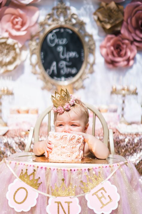 Once Upon A Time 1st Birthday Party idea. Pink ruffle smash cake bloomers. Flower princess gold crown baby girl. Princess Party. Pink Princess smash cake with gold number 1 candle. | A Touch of Pink Princess First Birthday Party Cake, Princess Theme One Year Old Party, Once Upon A Time First Birthday Smash Cake, Queen First Birthday Party Ideas, Once Upon A Time Smash Cake, 1st Birthday Once Upon A Time, Princess 1st Birthday Photo Shoot, Once Upon A Dream Birthday Party, Once Upon A Time 1st Birthday