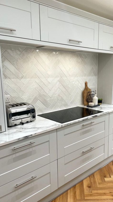 Paris Pearl Brick Effect Wall Tiles used in a herringbone pattern, serving as a kitchen splashback behind kitchen hob. Tiles Kitchen Floor, Brick Effect Wall Tiles, Cleaning Apartment, Hob Splashback, Cleaning Closet Organization, Herringbone Kitchen, Kitchen Hob, Kitchen Renovation Design, Kitchen Splashback Tiles