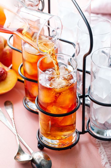 Cold-brew peach iced tea is sure to be your new favorite summer drink recipe! Ice Cold Drinks, Cold Brew Iced Tea, Peach Iced Tea, Making Iced Tea, Peach Syrup, Peach Ice Tea, Summer Drink Recipes, American Diner, Peach Tea