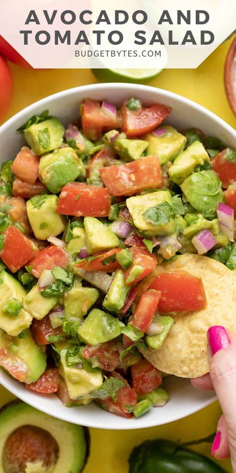 This simple avocado and tomato salad is a chunky mix of all of summer's fresh flavors, like tomato, avocado, lime, and cilantro. BudgetBytes.com Tomato Cucumber And Avocado Salad, Salad With Avocado Recipes, Tomato Avocado Salad Recipes, Things To Make With Avocado, Gourmet Mexican Food, Tomato And Avocado Salad, Gourmet Food Recipes, Avocado Vinaigrette, Tomato Avocado Salad