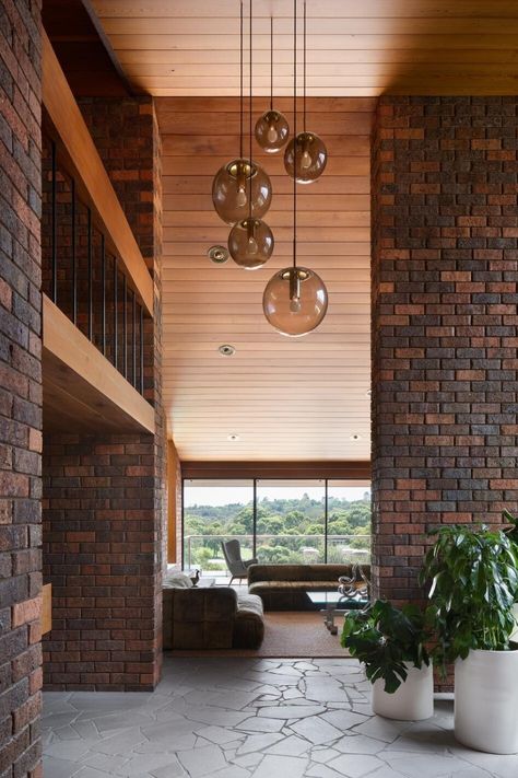 Raheen House designed by C. Kairouz Architects is timeless Hanging Fireplace, Modern Family Home, Melbourne Home, Midcentury House, Mcm House, Aesthetic Space, Mid Century Living, Wood Ceiling, Melbourne House