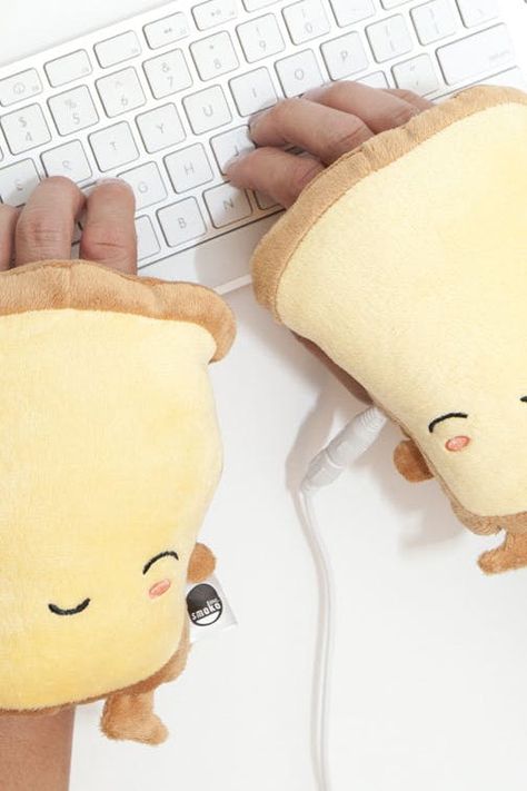 Your Office Is Freezing, but Hooray, These Toast-Shaped Hand Warmers Exist #purewow #winter #amazon #tech #accessories #shopping #news Cool Gadgets On Amazon, Cool Tech Gifts, Heated Gloves, Hand Gloves, Funny Toys, Novelty Toys, Gadgets And Gizmos, Tech Gifts, Ideas Christmas