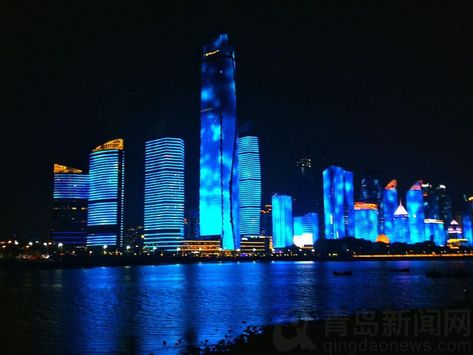 On the third beach of #Qingdao on a summer night, tourists are blowing the cool sea breeze, stepping on the soft beach, and watching the light show of Fushan Bay. Shanghai Aesthetic, China Beach, Asian Photography, Qingdao China, China City, Beach Night, Chongqing, Retro Waves, Futuristic City