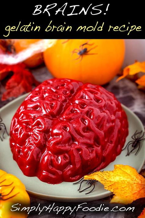 This Halloween Jello Brain Recipe for a brain mold makes a creepy gelatin brain that you can take to a Halloween party, or anywhere a jello brain would be appropriate. The Zombie Apocalypse comes to mind... Halloween recipe by simplyhappyfoodie.com #halloween #gelatinbrain Haunted Laboratory, Souper Halloween, Brain Jello Mold, Brain Recipes, Jello Brain, Brain Mold, Spooky Recipes, Zombie Food, Brain Cake