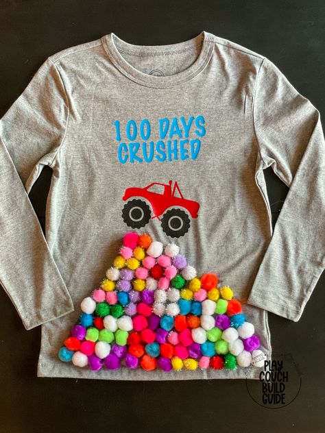 This is a gray t-shirt with 100 colorful, craft pom-poms, a monster truck driving over them and heat transfer vinyl lettering to say “100 DAYS CRUSHED!” 100 Days Of School Shirt Pom Poms, 100 Days Of School Shirt, School Craft, 100th Day Of School, Fun Shirt, Htv Vinyl, Fabric Glue, 100 Days Of School, 100th Day