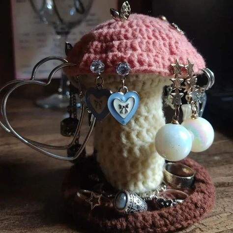 Mushroom Jewellery Holder❗️🍄 Get this little guy to hold your little accessories for you and look cute while it's at it🤭 Availabe in multiple colour combinations. Price: ₹350 (+ shipping) DM to order!! . . #jewellery #jewelleryholder #crochet #smallbusiness #mushroom #mushroomjewellery #mushroomjewelleryholder #mushroomholder #smallbusiness Crochet Mushroom Ring Holder, Mushroom Holder Crochet, Crochet Mushroom Jewellery Holder, Mushroom Design Dangle Jewelry Gift, Mushroom Charm Bracelet, Little Accessories, Jewellery Holder, Mushroom Jewelry, Hold You