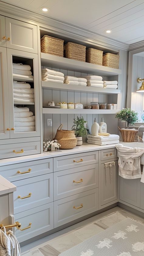 Transform your laundry space with these 44 stunning laundry room ideas to inspire you! From clever storage solutions to stylish design tips, discover how to make your laundry room both functional and beautiful. 🧺✨ #LaundryRoom #HomeInspiration #InteriorDesign Crown Molding In Laundry Room, Laundry Wall Storage, Styling Laundry Room, Dream Mudroom Laundry, Laundry Room Design Large, Laundry Room Storage Idea, New Laundry Room Ideas, Breezeway Laundry Room, Laundry Room With Storage Ideas