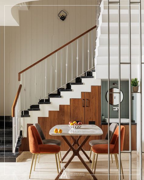 Smart Space Utilization: A refined partition defines the dining space, complemented by a functional wash basin tucked under the staircase, maximizing efficiency without compromising on aesthetics. Project: Aangan Location: Kamal Vihar, Raipur Design & Execution: @_the_design_space_ 📸 : @vedantsharma.photo © All Designs & Images copyrights at The Design Space. #thedesignspace#interiordesigner#designinnovation#designinspiration#homedecor#furniture #Interiordesign #LuxuryInteriorscapes#earthy... Basin Under Staircase, Dining Under Staircase, Wash Basin Under Staircase, Dining Table Under Stairs, Dining Wash Basin Design, Under Staircase, Townhouse Ideas, Main Gates, 30x40 House Plans