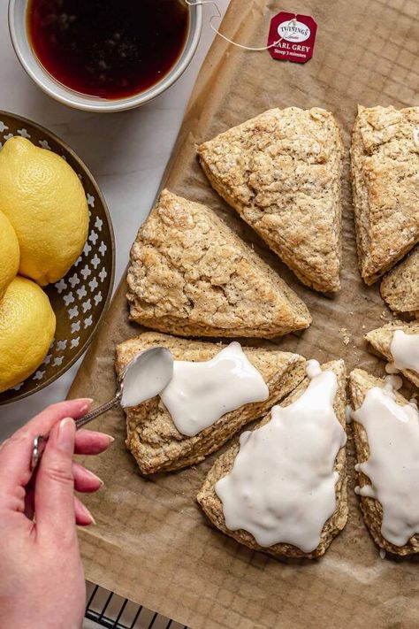 These light and fluffy earl grey scones are full of earl grey tea and get topped with a bright lemon glaze. Full of that lovely bergamot flavor, these pair perfectly with a London Fog, coffee, and also make an excellent afternoon snack. Forget those overly dry, crumbly scones you may have had in the past, because these are about to knock those out of the park! These earl grey lemon scones are moist and fluffy, and are packed with a subtle earl grey flavor (also known as bergamot), wh… Earl Grey Scones, Apple Streusel Muffins, Pistachio Muffins, Cream Cheese Puff Pastry, Chiffon Pie, Apple Streusel, Plum Recipes, Lemon Scones, Cheese Puff