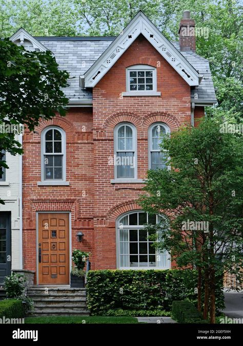 Download this stock image: Older urban brick three story townhouse with gable - 2GEF5XH from Alamy's library of millions of high resolution stock photos, illustrations and vectors. Three Story Brick House, Brick Townhouse Exterior, German Townhouse, Old Brick Homes, Old European House, European Townhouse, Rural Sketching, Three Story Townhouse, Cute Townhouse