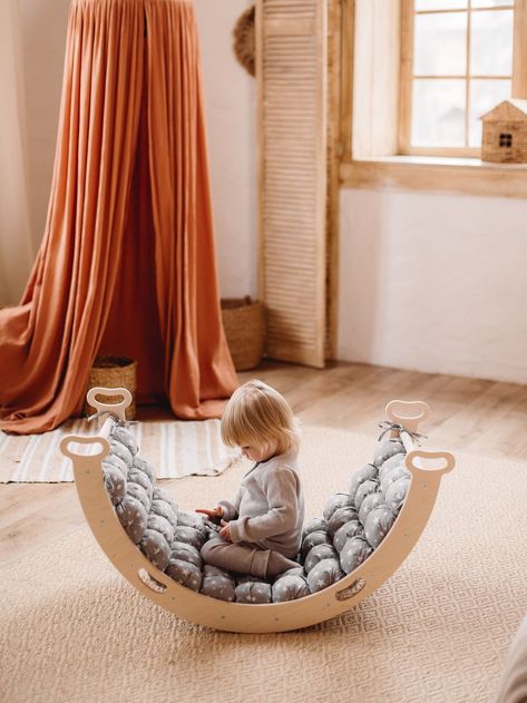 Montessori Arch Pillow - Climbing Arch Cushion ✨ #toddlergames #toddlers #toddlertoys #firstbirthday #firstbirthdayideas #nurserydecor #nursery #babyroom #babyroomdesign #kidsroom #toddlerroom #montessory #woodentoys #firstbirthdayparty #kidsofinstagram #playroomdecor #woodentoys #imagineplay #playroomdecor #playroomdesign #toddlerapproved #activitiesforkids #education #stemforkids Arch Rocker Pillow Pattern, Montessori Arch Pillow, Montessori Rocker, Climbing Arch, Rocking Cradle, Waldorf Inspired Toys, Rock Bed, Kids Armchair, Cool Bookshelves