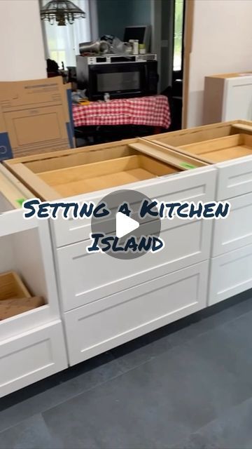 Jessica + Scott | DIY, Renovations & Home Building on Instagram: "Setting and securing kitchen island cabinets over tile!  Making sure it’s secure and doesn’t slide is super important!   #kitchenrenovation #homerenovation #newkitchen #newcabinets #installingcabinets #jshome" Kitchen Island Specs, Mobile Home Island Remodel, How To Design A Kitchen Island, Dairy Table Kitchen Island, Making A Kitchen Island From Cabinets, Kitchen Island With Base Cabinets, Remodel Kitchen Island, Kitchen Island Storage Both Sides, Kitchen Island Side Storage