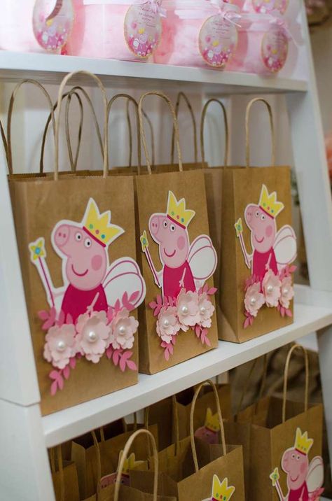 Annabelle’s Vintage Peppa Pig Adventure | CatchMyParty.com Pig Birthday Decorations, Peppa Pig Party Favors, Peppa Pig Birthday Party Ideas, Peppa Pig Birthday Decorations, Pig Birthday Party Ideas, Peppa Pig Party Decorations, Peppa Pig Birthday Party Decorations, Greta Gris, Peppa Pig Birthday Cake