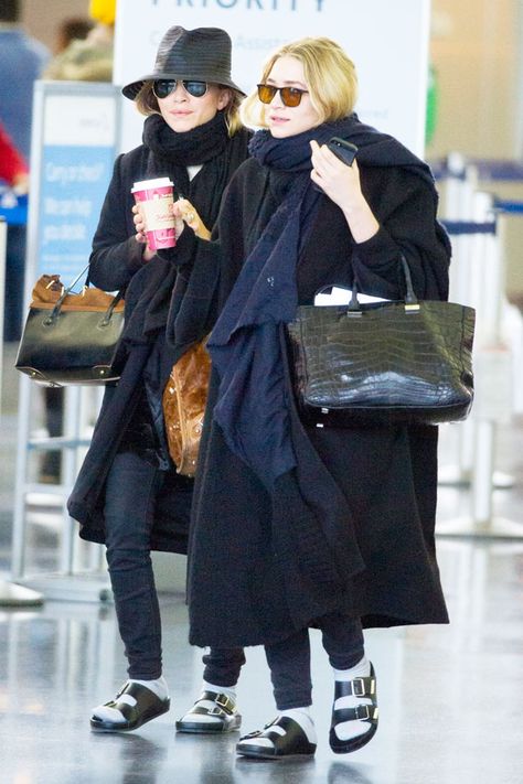 giant scarves, giant coats for tiny gals. The Olsen Twins Are Coordinating Their Socks  Sandals Now #Refinery29 Socks And Birks, Birks And Socks, Travel Wardrobe Spring, Ashley Olsen Style, Olsen Fashion, Olsen Twins Style, Olsen Sister, Matching Socks, Mary Kate Ashley