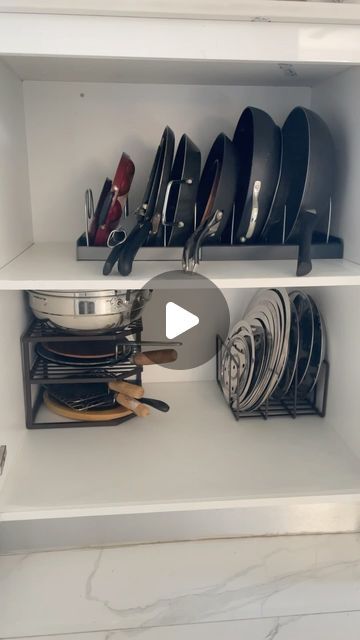 Minakshi Gajera on Instagram: "I picked up a perfect kitchen organiser to set up my pans and lids cabinet.  Using the right organizer for your pans, lids, and pots can significantly enhance your kitchen’s efficiency and aesthetics. It maximizes space, making it easier to access your cookware without the hassle of digging through stacks. An organizer protects your pots and pans from scratches, keeps your kitchen clutter-free, and speeds up your cooking process by having everything neatly in place. This small change leads to a more enjoyable and stress-free cooking experience, making your kitchen more inviting and functional.  For anyone wondering 🤔 Top shelf organiser is linked in my bio. Bottom shelf organisers are from Costco.  What is your biggest challenge with storing pans and lids? Pan Organizer Kitchen, Saucepan Storage Ideas, Pan Storage Ideas, Pots And Pans Organization, Kitchen Pans Organization, Kitchen Organisers, Pan Organizer, Kitchen Organiser, Pot Organization